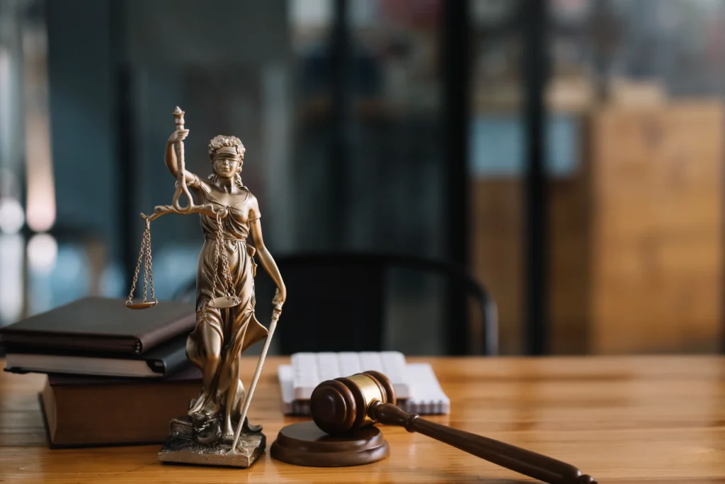 statue of lady justice on desk of a judge or lawye 2026 01 08 06 49 39 utc